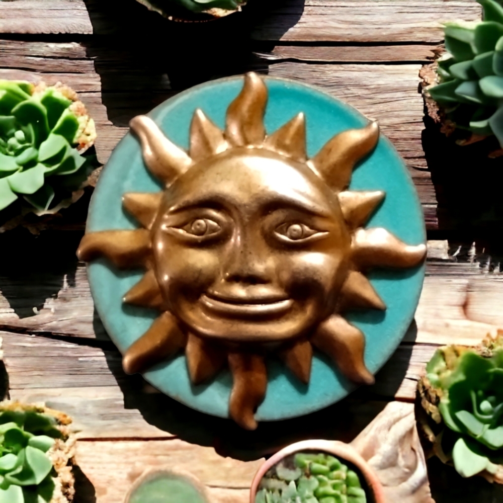 Beautiful vintage teal and silver Sun brooch